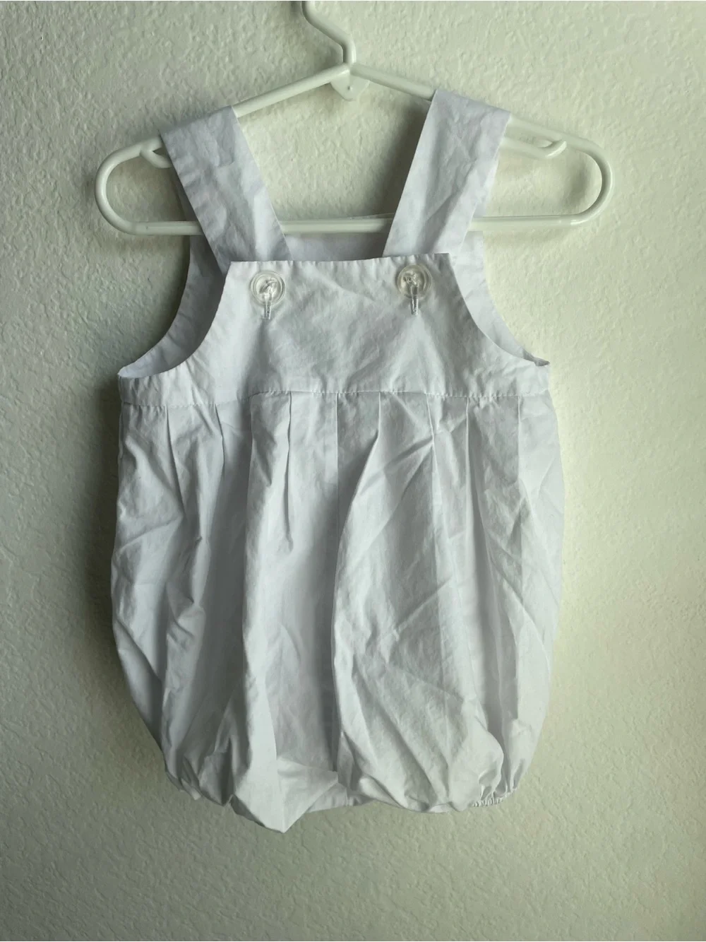 The Beaufort Bonnet Company white bubble outfit embroidered “Frank”